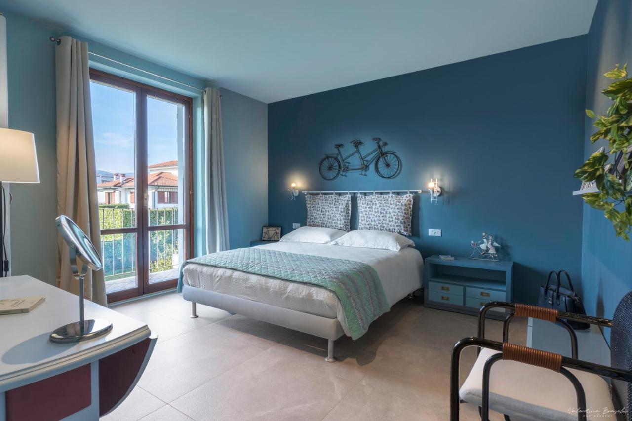 Draisina Bike Apartments Due Oleggio Castello Bagian luar foto
